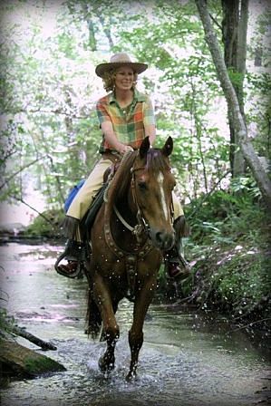 Trail riding through the creek